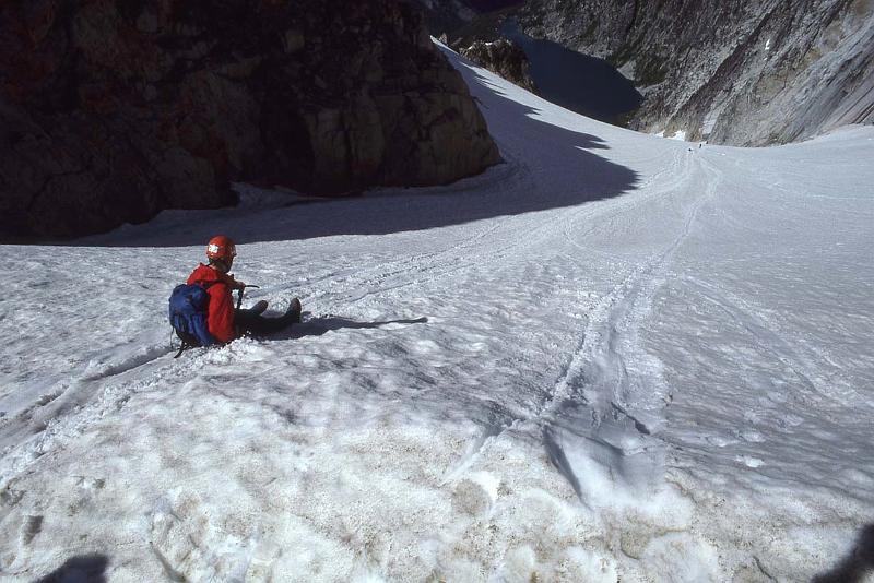 1988-035 Colchuck Pk N Buttress Jul 1988 011 Glissading to Colchuck Lake.jpg